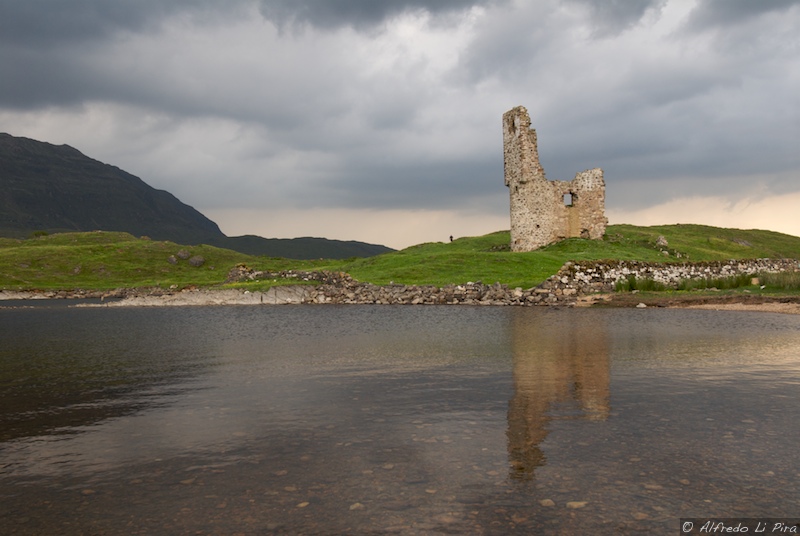 Ardvaek castle in the Scottish highlands at sunset